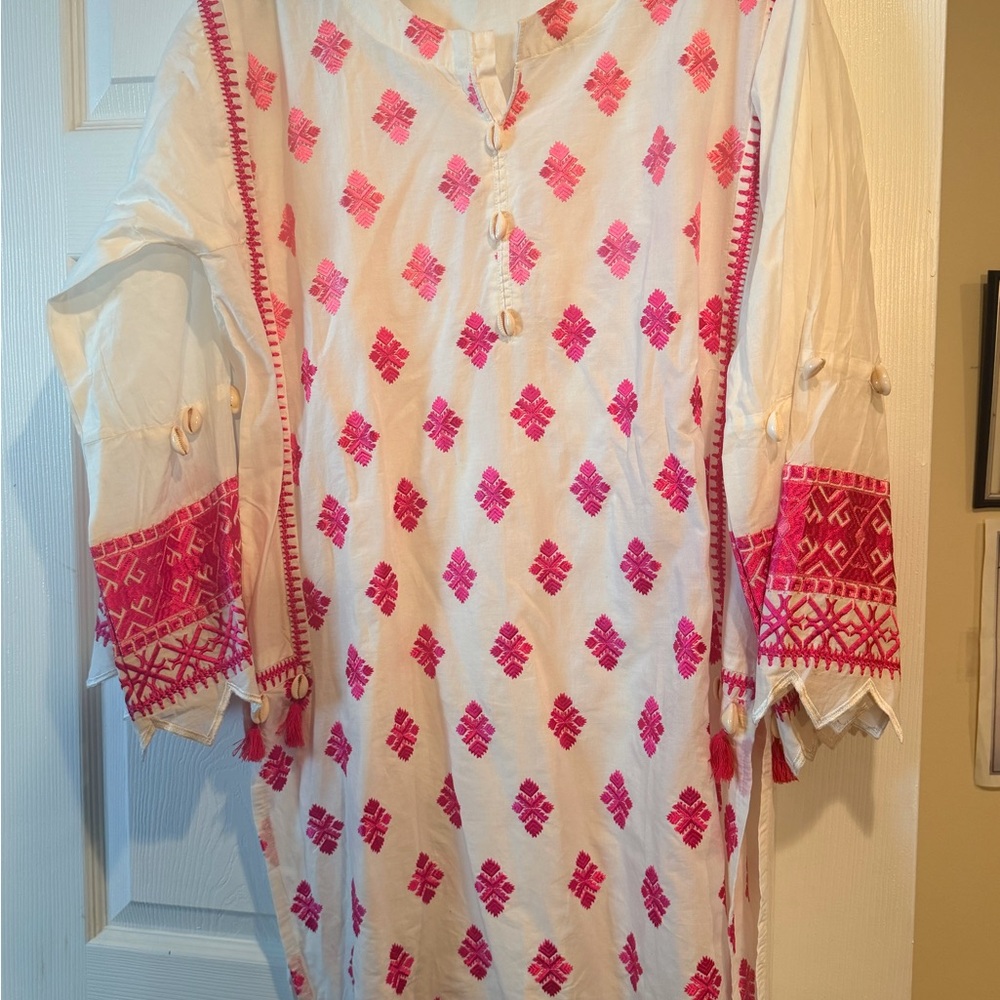 Pakistani White Kurta with pink shaded embroidry with shells and tussels